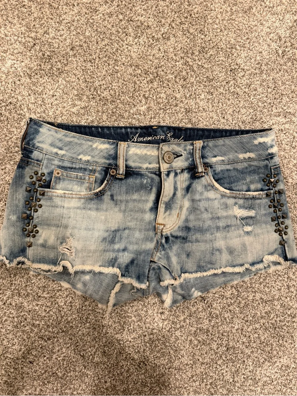 American Eagle Outfitters Faded Blue Denim Cutoff Shorts with Stud Accents